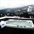 6-person hot tub and view of mountains