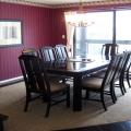 Large dining room with room for eight and access to one of two decks