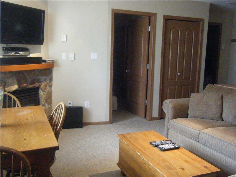 Whistler Accommodations - Living room with gas fireplace and flatscreen TV - Rentals By Owner