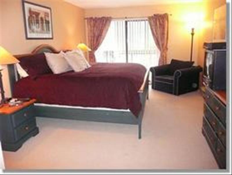 Whistler Accommodations - Master Bedroom with king bed and ensuite bathroom - Rentals By Owner