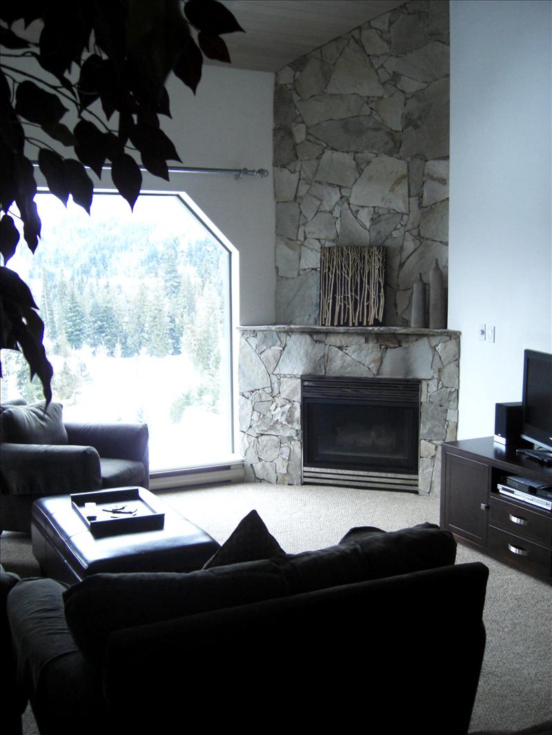Whistler Accommodations - Sunken living room with sprawling view of golf course and mountains - Rentals By Owner