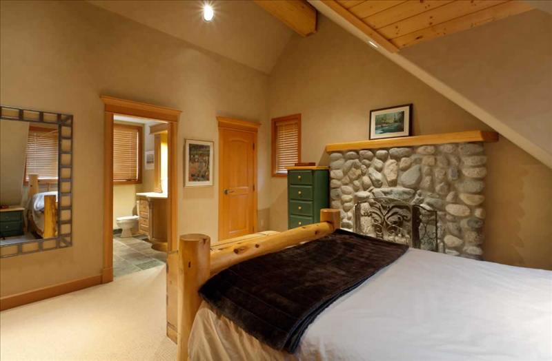 Whistler Accommodations - Luxury Chalet Bedroom with Fireplace - Rentals By Owner