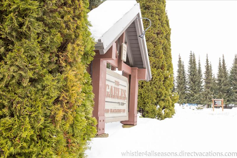 Whistler Accommodations - Townhome is located in The Gables right at the Blackcomb base. Blackcomb base sign is visible. - Rentals By Owner