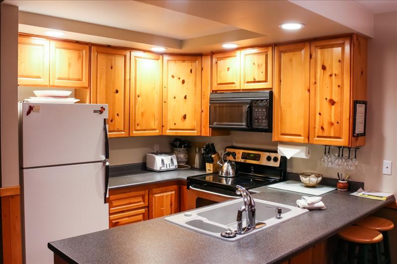 Whistler Accommodations - Fully equipped kitchen with breakfast bar - Rentals By Owner