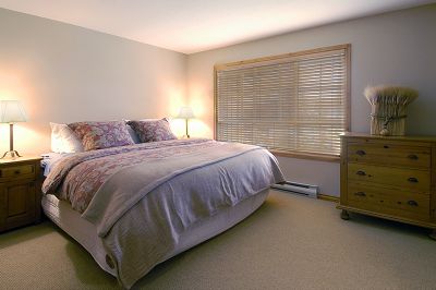 Whistler Accommodations - The Master bedroom with King sized bed and private ensuite. Full bathroom, oversized tub, heated floors - Rentals By Owner