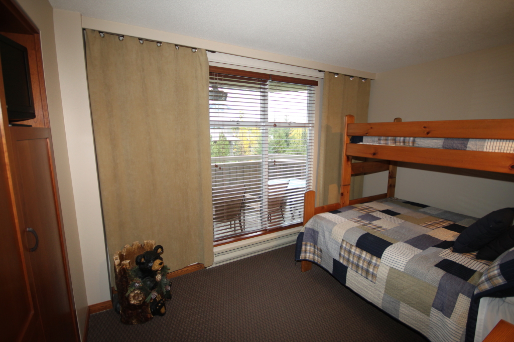 Whistler Accommodations - Second bedroom with queen and single beds - Rentals By Owner